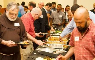 Guests sharing a meal at the Sharing Ramadan iftar